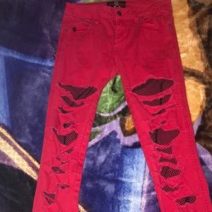 Red ripped skinnies